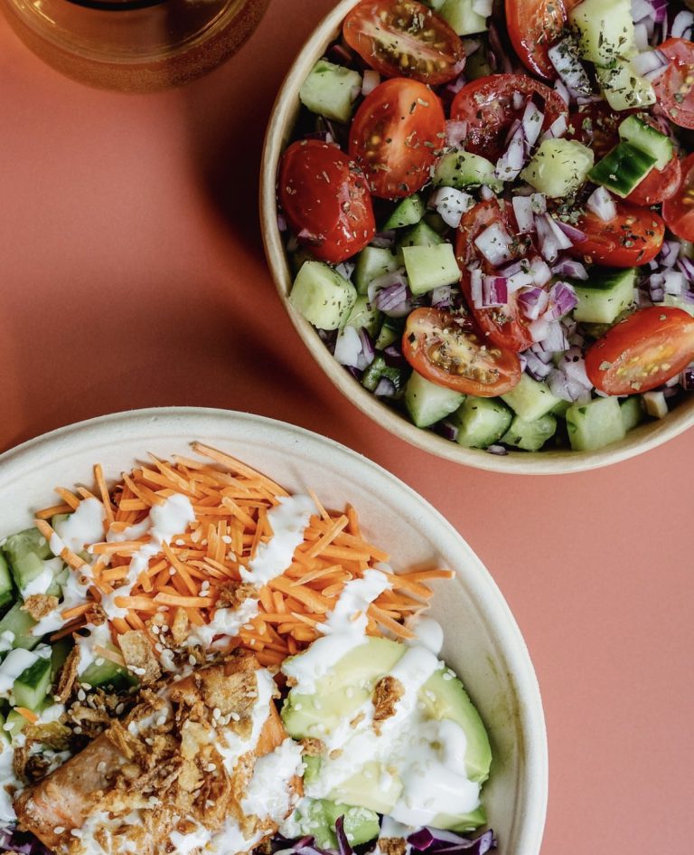 Traditional Persian feast with colorful dishes, saffron rice, kebabs, and fresh herbs